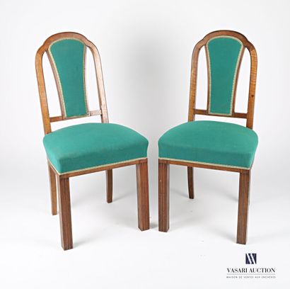 null Pair of chairs in molded natural wood, the three-lobed back and openwork of...