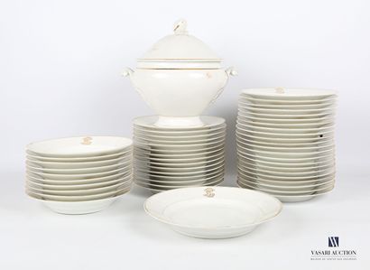 null White porcelain dinner service decorated with gold nets and a monogram on the...