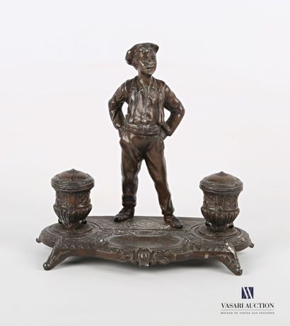 null Inkwell with two windows in regula showing a young man with his hands on his...