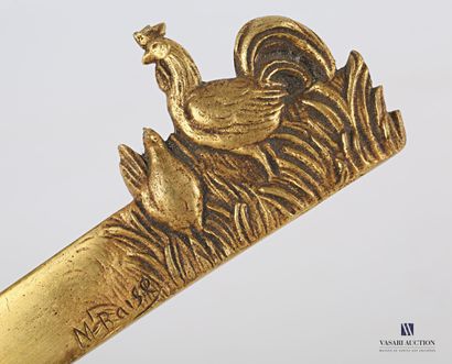 null Set of two paper-cutters, the first one in bronze decorated with two hens, signed...