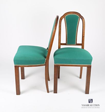 null Pair of chairs in molded natural wood, the three-lobed back and openwork of...