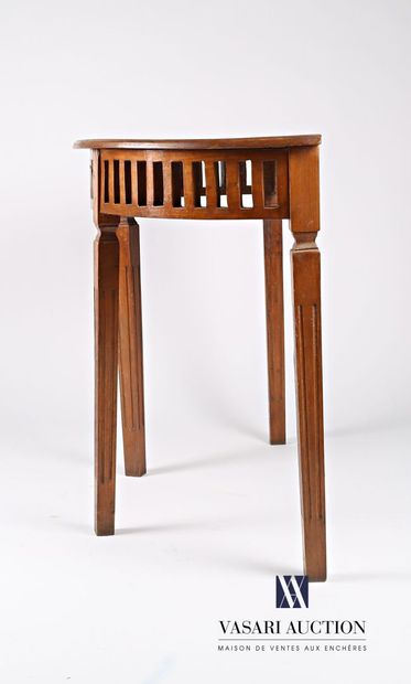 null Half moon shaped console in molded fruitwood, the openwork belt, it rests on...