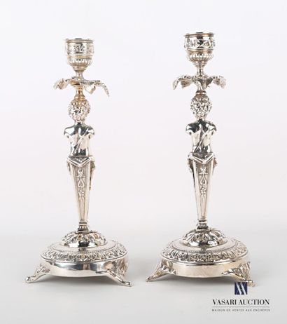 null Pair of silver plated bronze torches standing on a round base with a doucine...