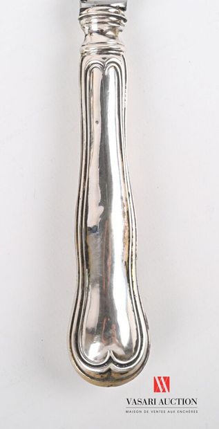 null Bread knife, the silver plated metal handle of violoné form is hemmed with nets,...