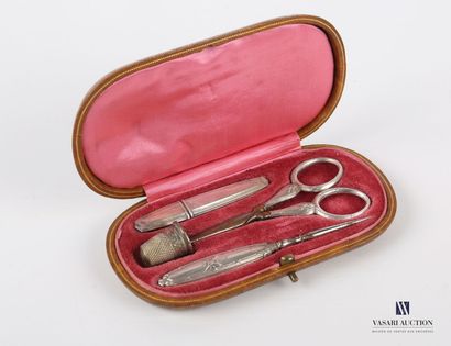 null Silver plated metal sewing kit in its leather case including a pair of scissors...