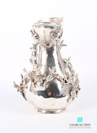 null Pitcher in silver plated bronze piriform with decoration in high relief and...