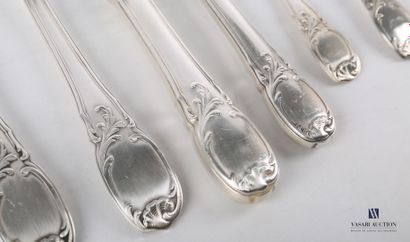 null Silver-plated metal household set, the handle decorated with nets and foliage...