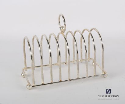 null Silver plated metal toast holder with eight niches, it is topped by a ring-shaped...