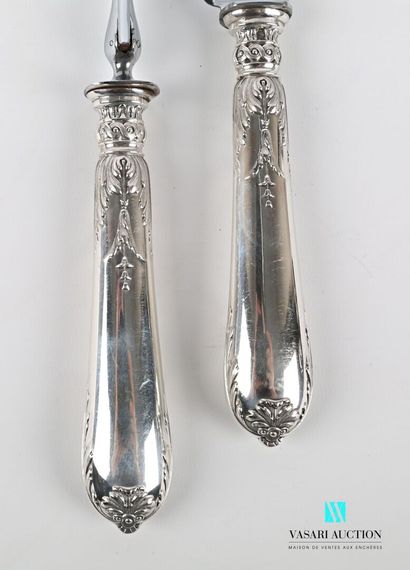 null Cutlery service, silver handles decorated with acanthus leaves in fall surmounted...