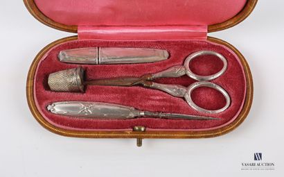 null Silver plated metal sewing kit in its leather case including a pair of scissors...