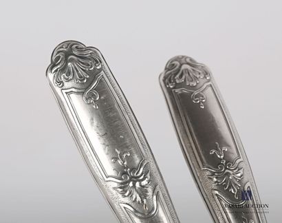 null Fish serving utensil, the silver handle decorated with asparagus points in reserves...