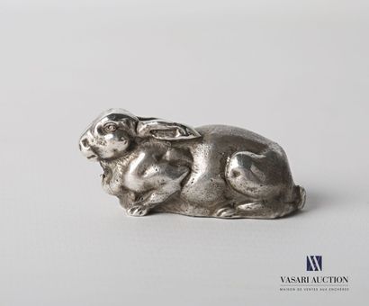 null Silver subject representing a rabbit lying down.

Weight : 93,49 g - Height....