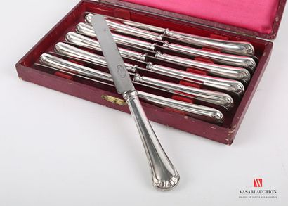 null Twelve dessert knives, the handle in silver plated metal decorated with nets...