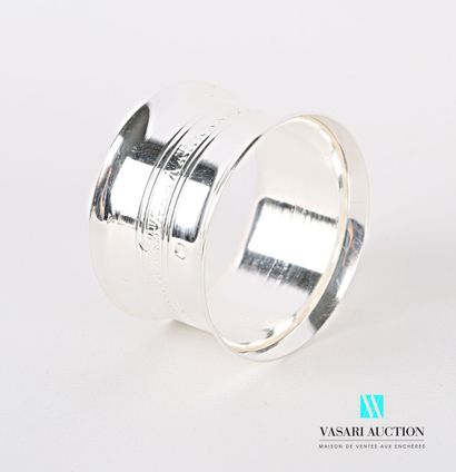 null Silver napkin ring, the concave border decorated in its center with a frieze...