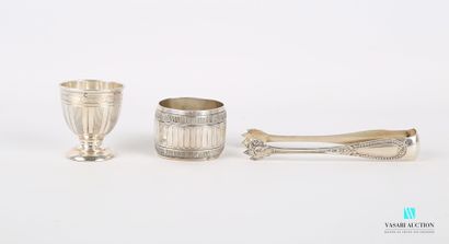 null Silver lot including an egg cup decorated with stripes, the edge hemmed with...