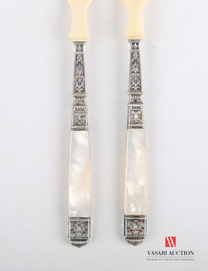 null Salad serving set, the mother-of-pearl handle is flanked by silver rings and...