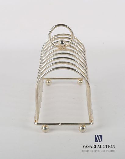 null Silver plated metal toast holder with eight niches, it is topped by a ring-shaped...