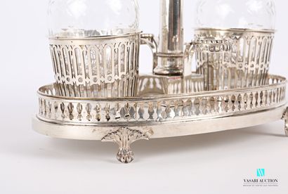 null Oil cruet in silver, the basin of oval form posing on four feet claws of lion...