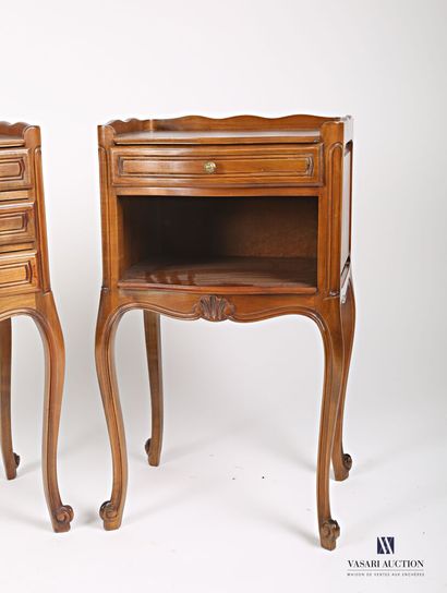 null Set of two bedside tables in molded and carved natural wood, the tray hemmed...