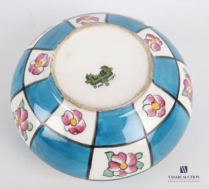 null LIMOGES

Porcelain inkwell of round form with polychrome decoration of squares...