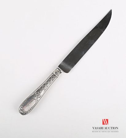 null Carving knife, the handle in filled silver is hemmed with fillets and decorated...