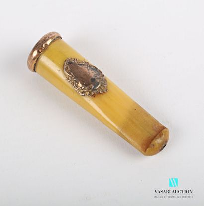 null Lot including a tinted horn cigar holder with a blind cartridge, the silver...