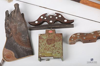 null Lot including two falconer's gloves, two wooden bows, a fawn leather bag, a...