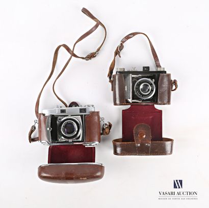 null Set of two cameras including a KODAK RETINA IIC camera, bellows lens - a WELTA...