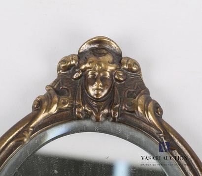 null Hand mirror in metal surmounted by a female mascaron, the grip showing a putto

Beginning...