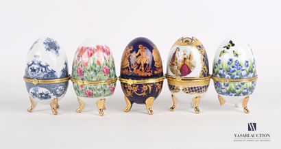 null Set of five porcelain boxes in the shape of egg, they rest on feet skates, the...