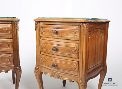 null Pair of bedside tables in molded and carved natural wood, decorated with acanthus...