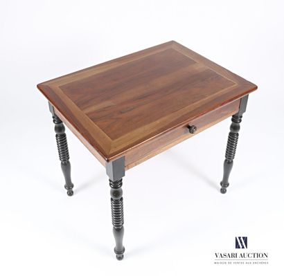 null Writing table in molded natural wood, the tray of rectangular form, it opens...