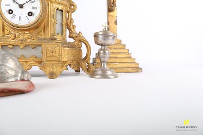 null Lot including, a clock in gilded regule, the white enamelled dial with Roman...