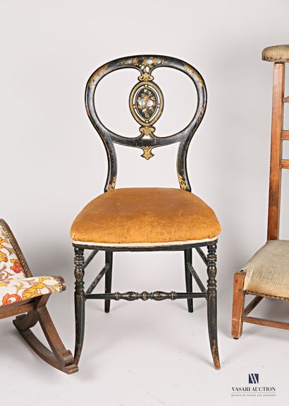 null Lot including a chair in molded natural wood, blackened, burgauté and heightened...