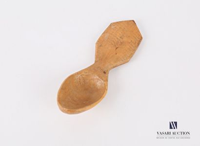 null Spoon in light wood with a narrow spoon with a slightly concave edge on the...