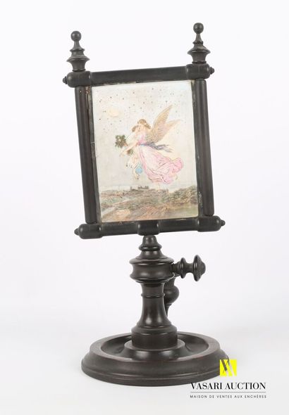 null Turned wood candlestick with a rectangular cookie screen decorated with an angel...