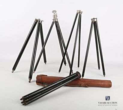 null Set of five black lacquered metal telescopic tripods, one in its case.

(jumps...