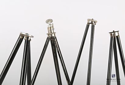 null Set of five black lacquered metal telescopic tripods, one in its case.

(jumps...