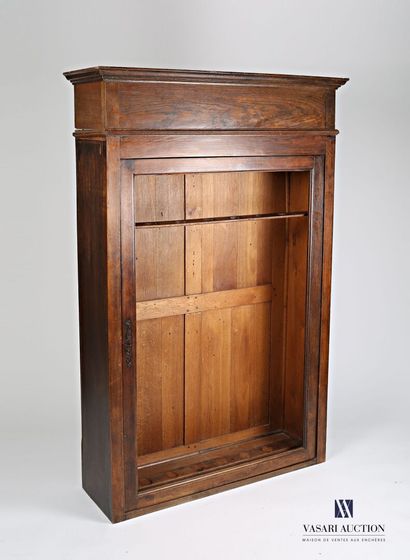 null Gun cabinet in molded natural wood, it opens with an openwork door in front...