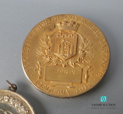 null Lot of silver and silver gilt medals, the first one showing a boat sailing on...