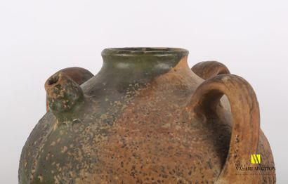 null Oil jar in terra cotta, the ovoid body decorated with three handles and a spout.

Height...