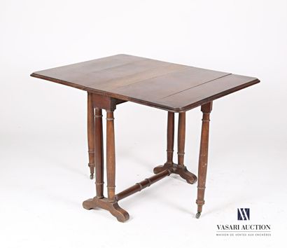 null Table with recessed natural wood molding, the rectangular top with two flaps,...