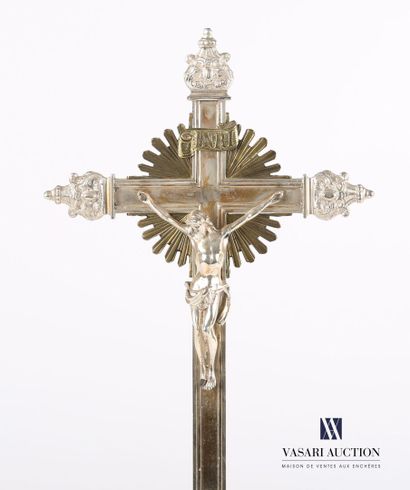 null Silver-plated metal cross standing on a rectangular base finished by four leafy...