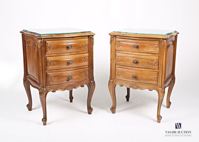 null Pair of bedside tables in molded and carved natural wood, decorated with acanthus...
