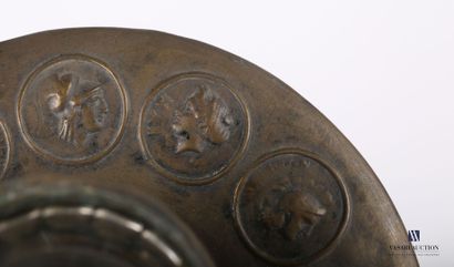 null Bronze inkwell with a spherical vase in its center, resting on a frame hemmed...