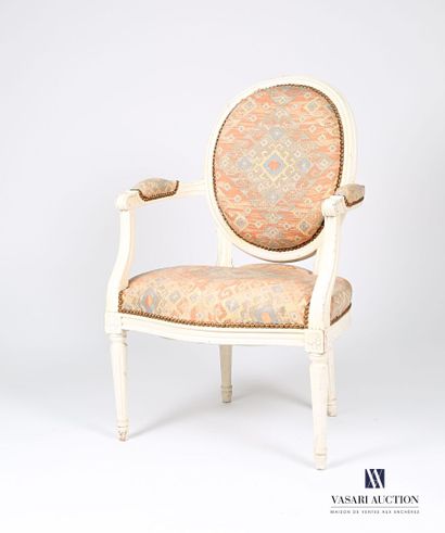 null Armchair in natural wood, molded, beige lacquered, the back medallion, the armrests...