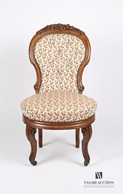 null Molded and carved oak chair, the balloon back upholstered and topped with fruit...