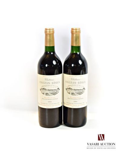 null 2 bouteilles	Château RAUZAN SÉGLA	Margaux GCC	1994

	Et. un peu tachées. N :...