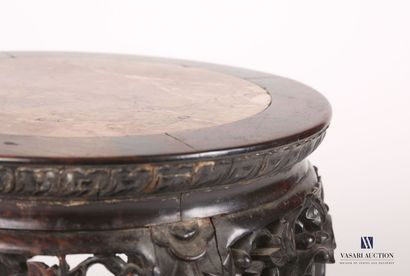 null Iron wood saddle, the round tray, dark red veined marble, is highlighted by...