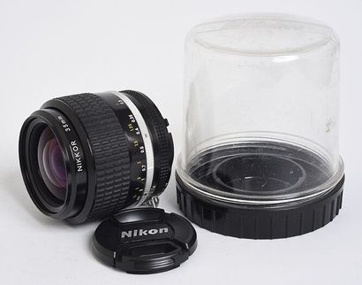null Nikon (silver) Nikkor Ai 35mm f/1.4 lens with its plexiglas protection box and...